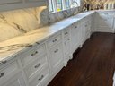 An L-Shaped Group Of Custom Lower Cabinets - Stunning Calacatta Monet Marble Counters - Delivery Available