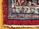 A Vintage Persian Wool Area Rug In A Traditional Style, 77x56