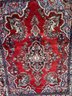 A Vintage Persian Wool Area Rug In A Traditional Style, 77x56