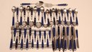 A LARGE 51 PIECE VINTAGE LOT OF COBALT BLUE WITH RIVETED HANDLES FLATWARE BY PALETTE / ONEIDA
