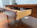 A Grained Maple Coffee Table By Ethan Allen