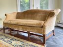 A Vintage Camel Back Sofa In Velvet