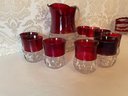 Vintage Ruby Glass Thumbnail Pitcher And 9 Glasses.