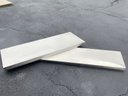 A Pair Of Stainless Steel Countertop Pieces - Perfect For Your Next Project