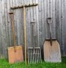 A Group Of 4 Primitive Wooden Farm Tools