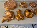 Assortment Of Copper And Aluminum Molds And Copper Teapot