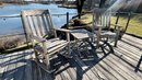 Pair Of Weathered Teak Rocking Chairs And Teak Cocktail Table