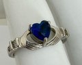 STERLING SILVER AND BLUE STONE CLADDAGH RING