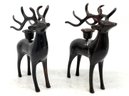 A Pair Of Modern Bronze Reindeer Candle Holders