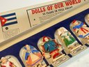 8 PLASTIC DOLLS OF THE WORLD WITH PAPER  WORK AND FLAGS - BY COMMONWEALTH PRODUCTS CORP