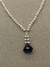 A Vintage Pearl Necklace With Sterling Silver Clasp