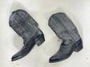 A Pair Of Men's Western Boots