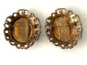 Two Oval Pins Brooches In Similar Pierced Metal Frames
