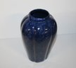 Hand Painted Biscut Jar Paired With Tall Glazed Ceramic Vase