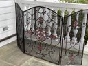 A Large Wrought Iron Fireplace Screen
