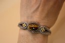 Bixby 925 Sterling Silver And Tiger Eye With 18K Gold Flower Embelishments Bracelet Hinged