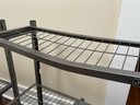 A Pair Of Collapsible Heavy Duty Metal Shelves