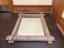 A Rustic Wood Mirror By Uttermost