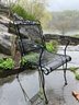 A Vintage Hexagonal Wrought Iron And Mesh Patio Set And 6 Chairs