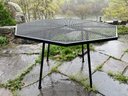 A Vintage Hexagonal Wrought Iron And Mesh Patio Set And 6 Chairs