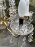 A Crystal And Brass Chandelier