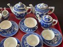 TWO ANTIQUE BLUE WILLOW CHILDRENS TEA SETS