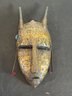 BRONZE OVER WOOD AFRICAN MASK