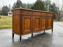 A Vintage French Directoire Credenza With Faux Marble Top By Baker Furniture