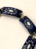 Dainty Enameled-link Bracelet With Blue, White And Gray Sunburst Design
