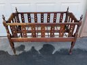 Antique Foldable Childs Crib. Measures  When Open: 50'x 26' X 37' Tall.  Measures 5 3/4' Wide When Closed.