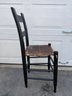 Antique Child's Side Chair With Original Rush Seat. Original Decoration On Back Slats.