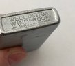 Vintage Wellington Windproof Cigarette Lighter With World Gear Logo 1984-5-20-55