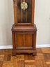 A Vintage Grandmother Clock By Howard Miller