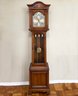 A Vintage Grandmother Clock By Howard Miller