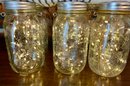 Set Of 9 Mason Jars With Solar Fairy Lights Inside