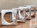 A Set Of Four Vintage Modern Silver Napkin Rings