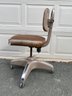 Mid-Century Adjustable Rolling Office Chair.
