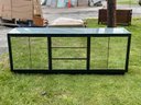 A Vintage Modern Mirror Paneled Credenza With Frosted Glass Top