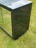 A Vintage Modern Mirror Paneled Credenza With Frosted Glass Top