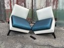 A Pair Of Modern Leather Slipper Chairs - AS IS