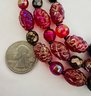 VINTAGE TRIPLE STRAND RED MOLDED GLASS NECKLACE