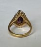 GOLD TONE PURPLE TEAR DROP AND WHITE STONE RING