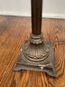 A Bronze Tone Stick Lamp
