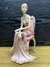Pair Of Resin 1920s Style Seated Flapper Girl Statue Figures.