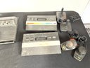 ATARI 2600 CONSOLE WITH CONTROLLERS AND TWO OTHER ATARI CONSOLES