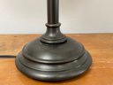 A Bronze Stick Lamp By Restoration Hardware