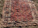Room Sized Antique Middle Eastern Tribal Rug With Low Pile And Primary Color Palette