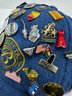 Over 70 Collectible Pins From World Travels On 2 Vintage Baseball Caps