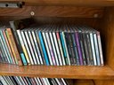 Nice Small Glass Door Cabinet Filled With Cd's