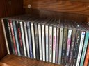 Nice Small Glass Door Cabinet Filled With Cd's